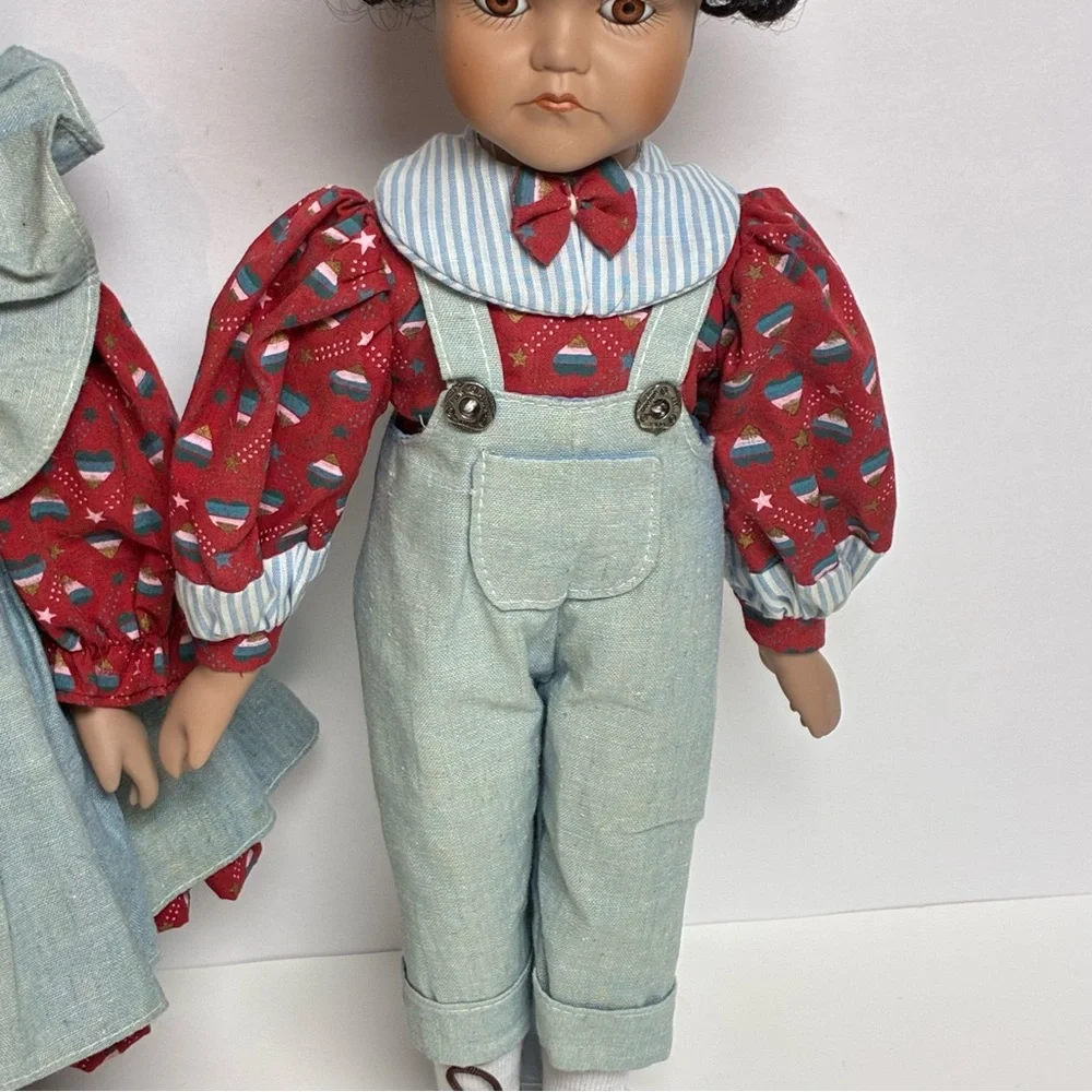Delton Product Corp. Porcelain Brown Boy Girl Dolls Stands Matching Outfits